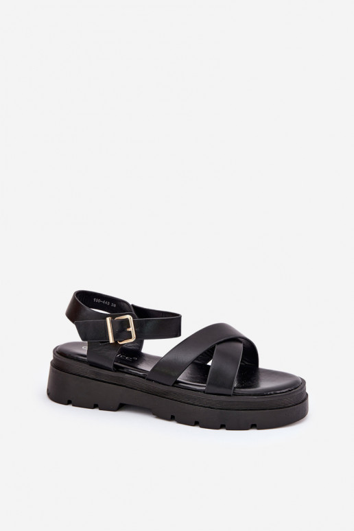 Sandalias de mujer con una plataforma de cuero ecológico de color negro Gevinniser