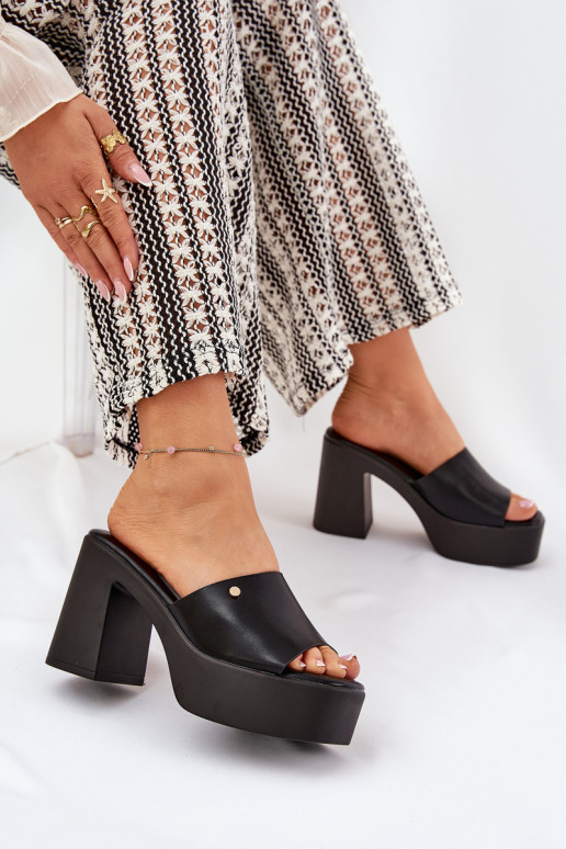 Femenino Zapatillas de cuero ecológico con tacones y plataforma de color negro Tamirella