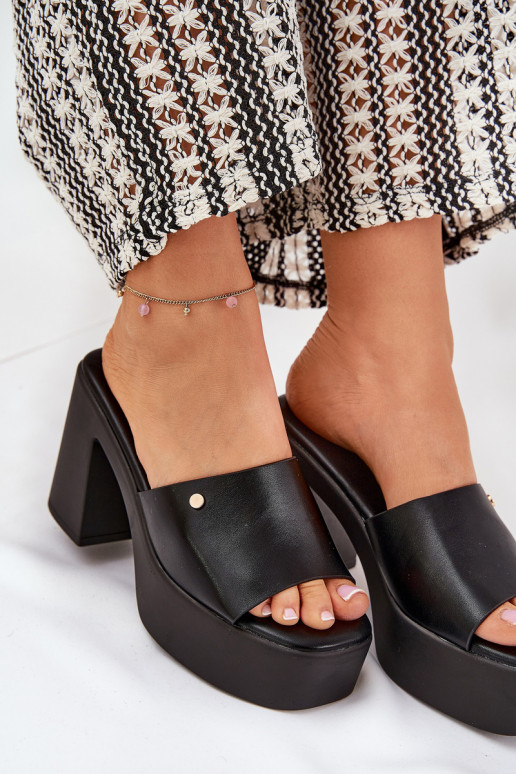 Femenino Zapatillas de cuero ecológico con tacones y plataforma de color negro Tamirella